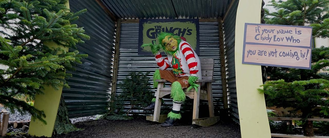 the grinch in a chair