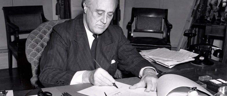 FDR signing bill. 