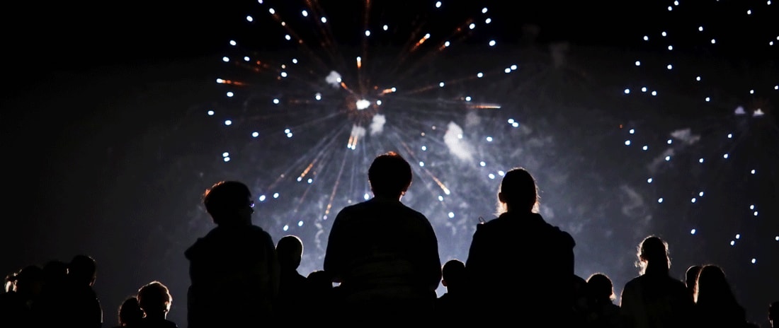 Photo of people and fireworks on New Years. 