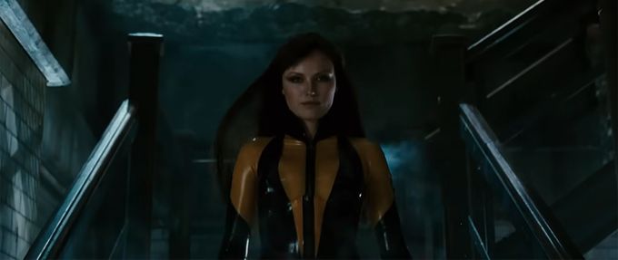 watchmen woman in a yellow supersuit