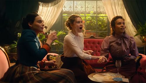 the-buccaneers-screenshot three women look shocked in the screenshot of 'The Buccaneers'