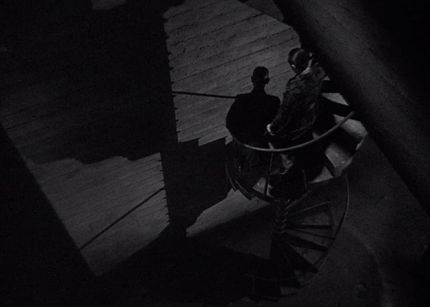 A spiral staircase featured in a still of the film 'The Black Cat'