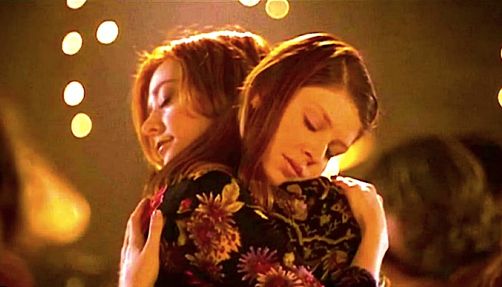 Willow Rosenberg and Tara Maclay embracing in a still from 'Buffy the Vampire Slayer'