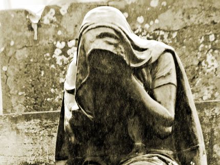 hooded figure