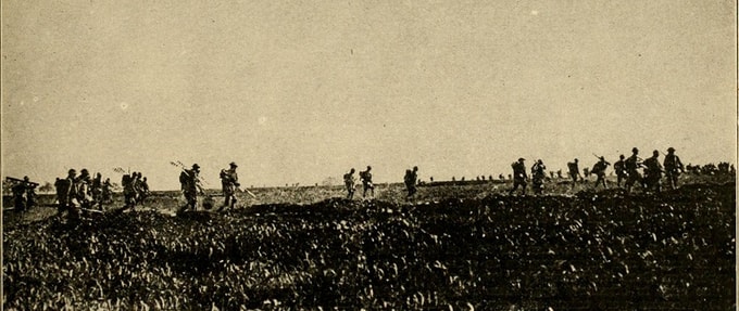 American soldiers walk along a ridge in Cantigny, the first American battle of World War I.