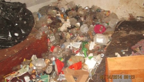 Photo of trash in house.