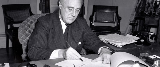 what-was-the-new-deal_feature FDR signing bill.