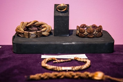 gold jewelry on a dais