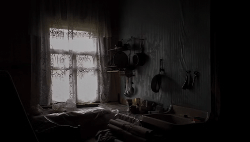 Spooky picture of darkly lit kitchen 