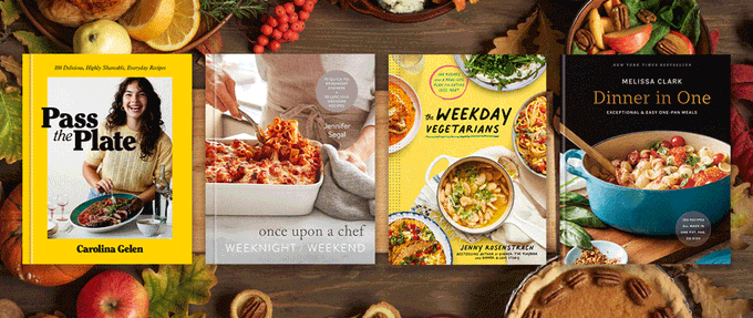 Four cookbooks against photo of dinner table.