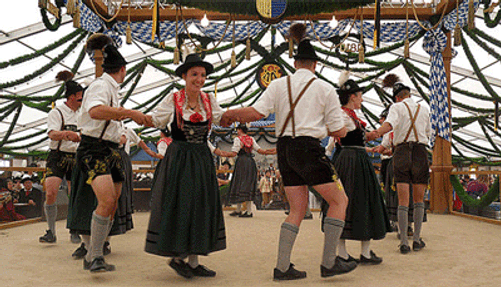 Photo of people at Oktoberfest dancing in 2010.