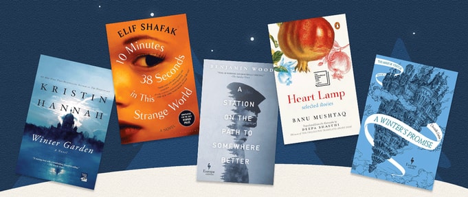 Covers of book club picks set against wintery background.