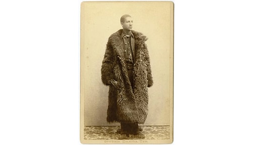 Photo of 25th Infantry soldier wearing a buffalo robe.