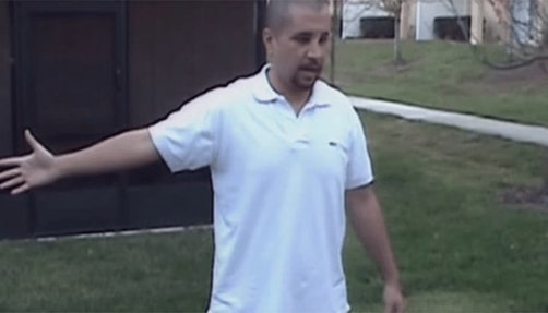 Photo of George Zimmerman reenacting confrontation.