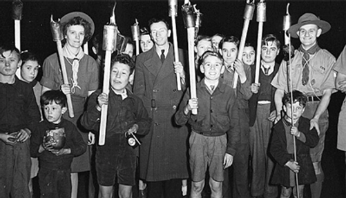 Photo of torchlight procession to celebrate Guy Fawkes night from 1947).