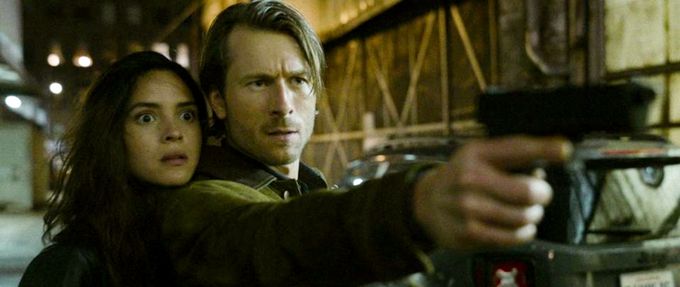 Glen Powell and Adria Arjona in a still from 'Hit Man'