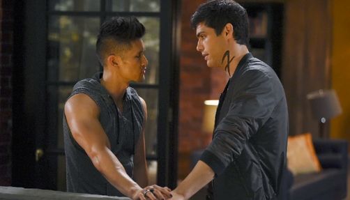 Alec Lightwood and Magnus Bane stare into each other's eyes in a still from 'Shadowhunters.'