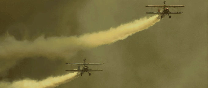 image of fighter planes in smokey sky 