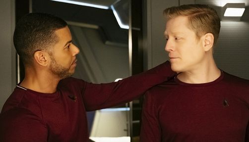 Paul Stamets and Hugh Culber stare into each other's eyes in a still from 'Star Trek: Discovery.'
