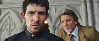 Josh O'Connor as Father Jud Duplenticy and Daniel Craig as Benoit Blanc in 'Wake Up Dead Man.'