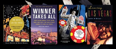 Four books about Las Vegas set against photo of cards.