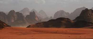 futuristic landscape of red sand and cliffs