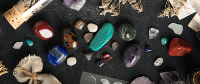 Image of stones, candles, flowers