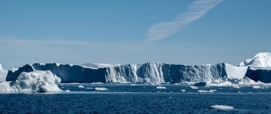 image of iceberg on blue water