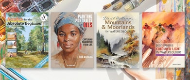 Four painting books set against background of canvas and painting brushes.