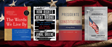 Four books set against American flag. 