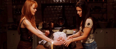 Sandra Bullock and Nicole Kidman performing a spell in 'Practical Magic'