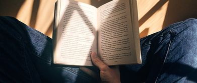 person reading in sunlight